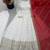 Designer off-white silk blend flared gown suit with contrast red heavy embroidered dupatta & trouser set for women