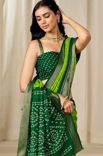 Kalini women dola silk bandhani print zari border saree