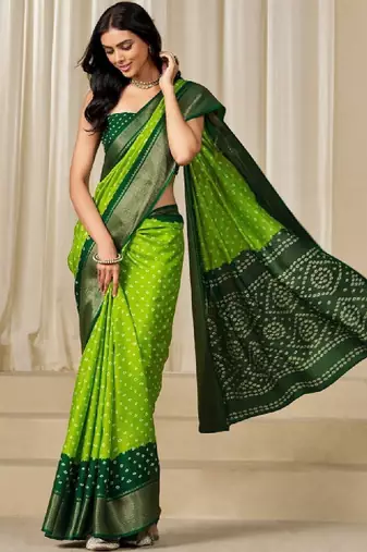 Kalini women dola silk bandhani print zari border saree