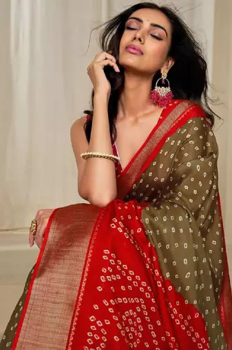 Kalini women dola silk bandhani print zari border saree