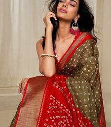 Kalini women dola silk bandhani print zari border saree