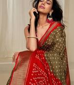 Kalini women dola silk bandhani print zari border saree