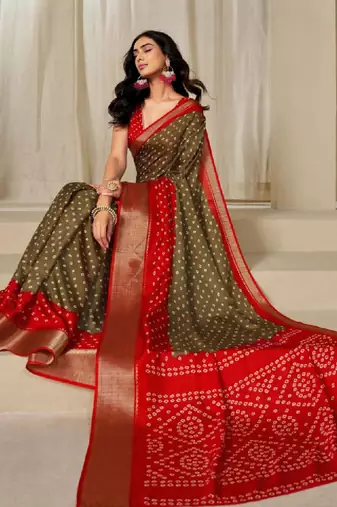 Kalini women dola silk bandhani print zari border saree