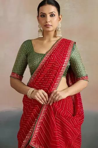 Striped sequinned pure georgette leheriya saree