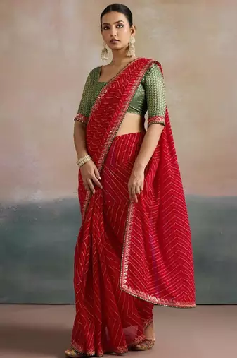Striped sequinned pure georgette leheriya saree