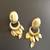 Gold plated chand leaf earrings