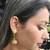 Gold plated green drop jhumka earrrings
