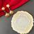 Gold plated green drop jhumka earrrings