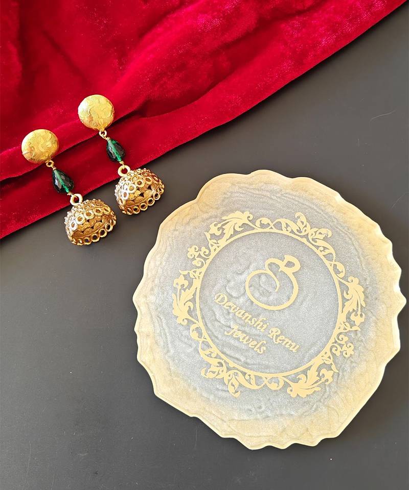 Gold plated green drop jhumka earrrings