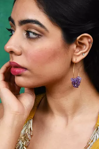 Gold plated purple round danglers earrings