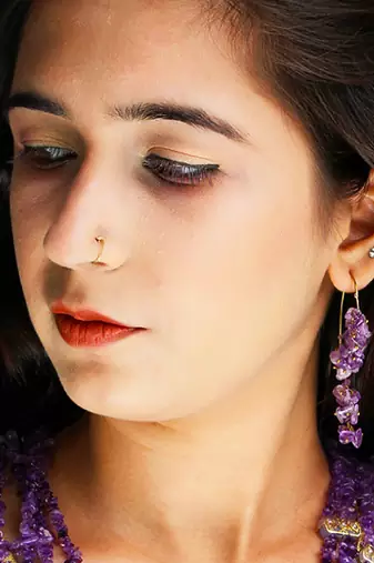 Gold plated purple drop dangler earrings