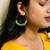 Gold plated green round dangler drop earrings