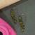 Gold plated green drop earrings