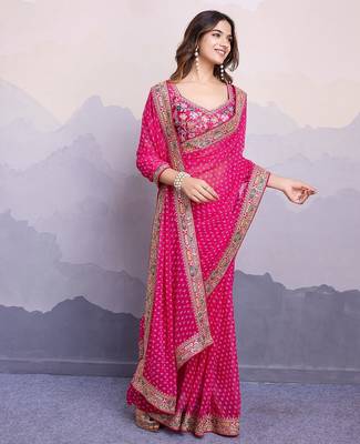 Pink georgette thared work embroidery border & leheriya printed saree whit blouse 5