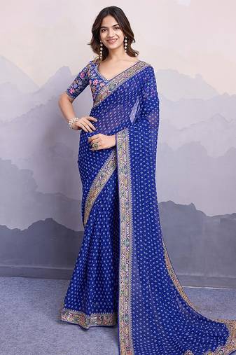Blue georgette thared work embroidery border & leheriya printed saree whit blouse