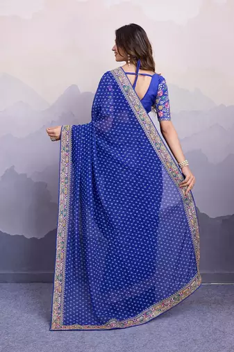 Blue georgette thared work embroidery border & leheriya printed saree whit blouse