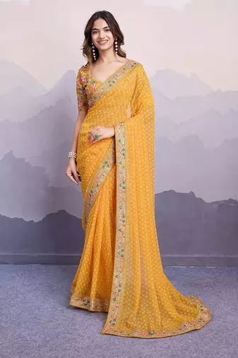 Yellow georgette thared work embroidery border & leheriya printed saree whit blouse