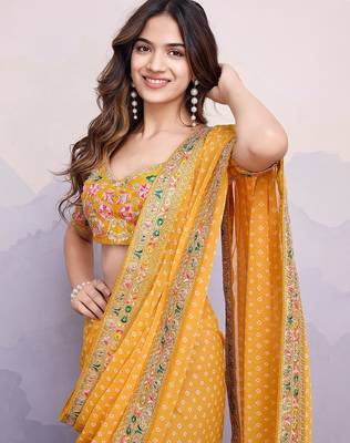 Yellow georgette thared work embroidery border & leheriya printed saree whit blouse 2