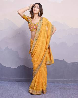 Yellow georgette thared work embroidery border & leheriya printed saree whit blouse 3