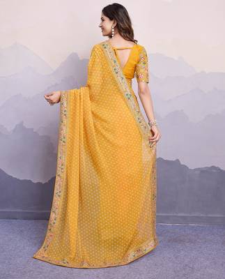 Yellow georgette thared work embroidery border & leheriya printed saree whit blouse 4