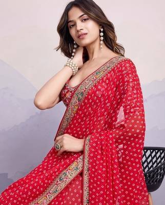 Red georgette thared work embroidery border & leheriya printed saree whit blouse 3