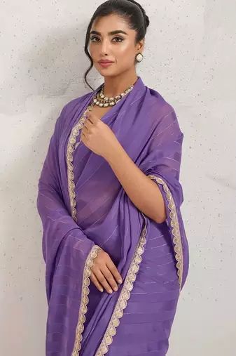 Purple georgette embroidery work lace border solid saree whit blouse