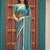Teal chiffon embroidery work lace border solid saree whit blouse