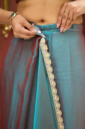 Teal chiffon embroidery work lace border solid saree whit blouse