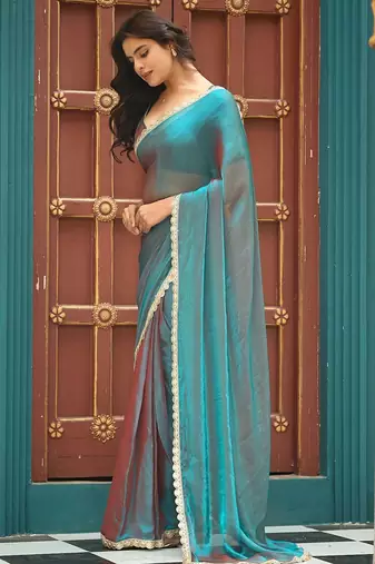 Teal chiffon embroidery work lace border solid saree whit blouse