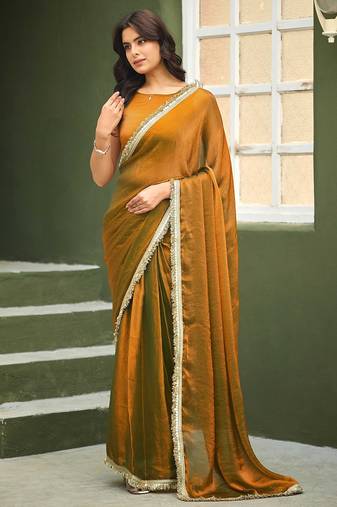 Gold chiffon embroidery work lace border solid saree whit blouse