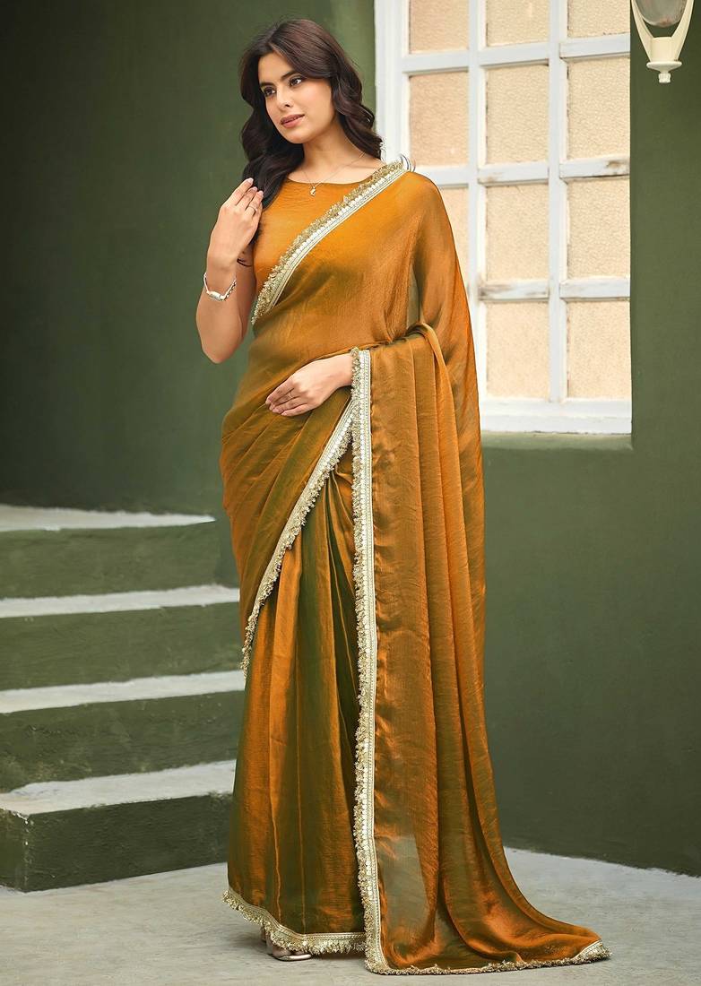 Gold chiffon embroidery work lace border solid saree whit blouse