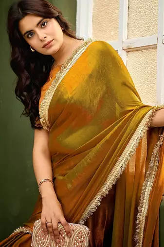 Gold chiffon embroidery work lace border solid saree whit blouse