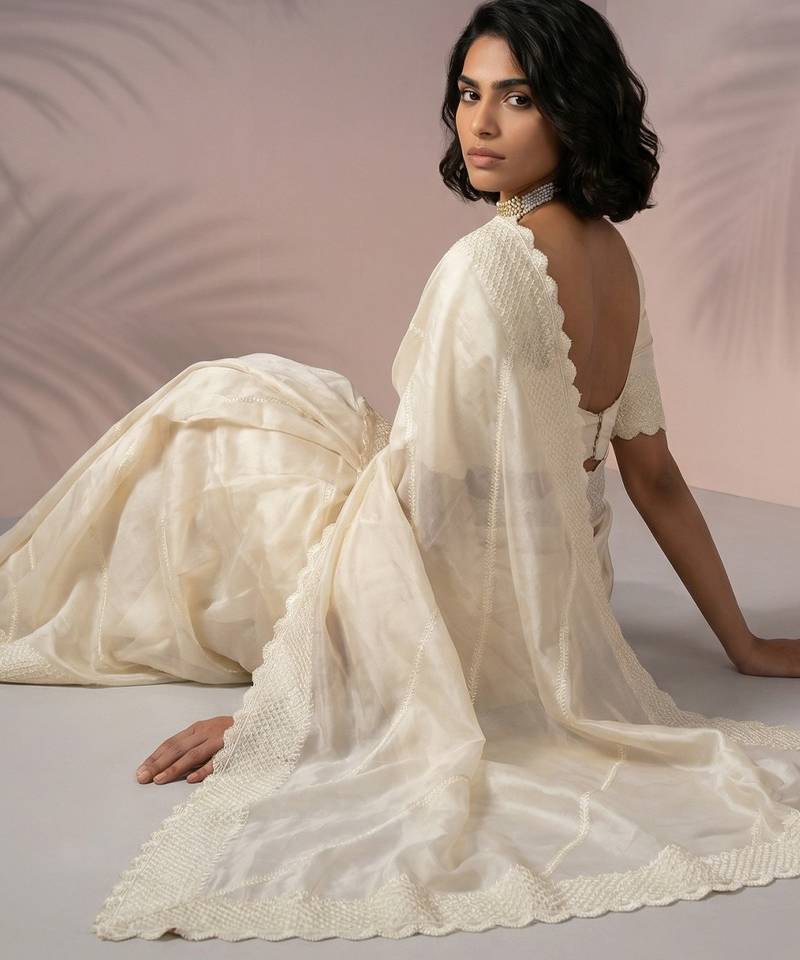 Cream silk blend printed woven design saree whit blouse