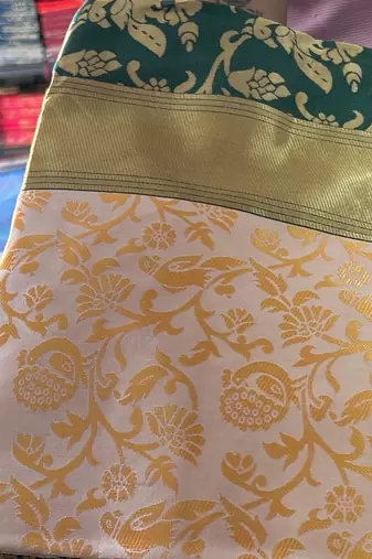 Green white silk blend banarasi saree with unstitched blouse piece