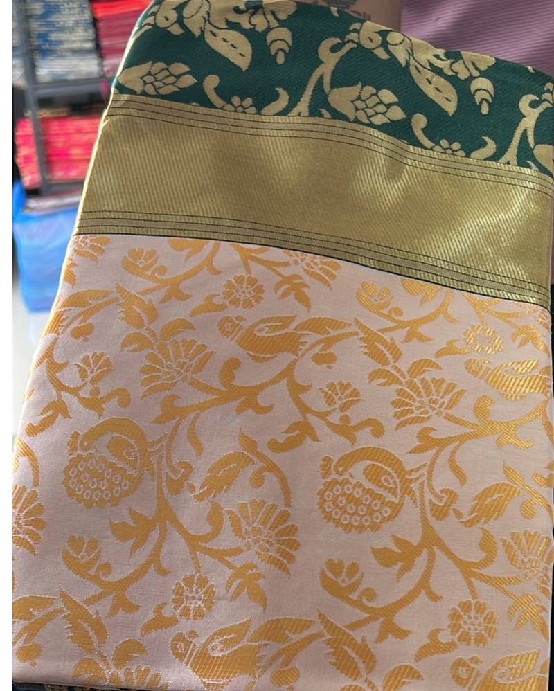 Green white silk blend banarasi saree with unstitched blouse piece
