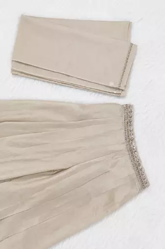 Regal ivory wedding sharara suit with bits and embroidered work