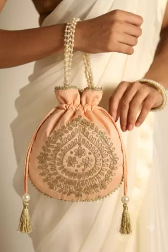 Peach satin potli bag