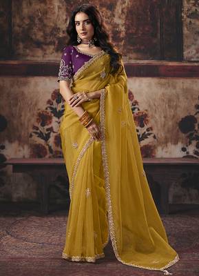 Mustard yellow faux organza saree with zari embroidered border & purple blouse 1