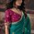 Teal green faux chiffon saree with zari embroidered border & magenta pink blouse