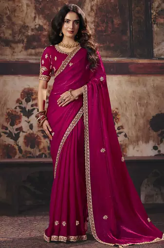 Rani pink faux satin saree with zari border & embroidered blouse