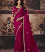 Rani pink faux satin saree with zari border & embroidered blouse