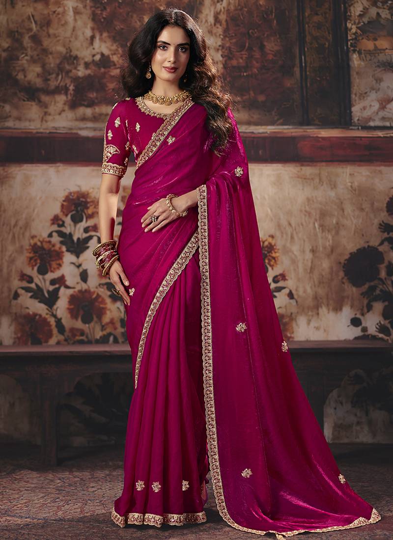 Rani pink faux satin saree with zari border & embroidered blouse