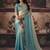 Cream & sky blue faux satin shimmer saree with embroidered blouse