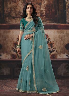 Sea green shimmer faux organza saree with embroidered blouse 1