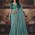 Sea green shimmer faux organza saree with embroidered blouse