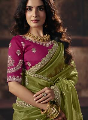 Olive green shimmer faux organza saree with rani pink embroidered blouse 2