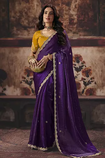 Dark purple shimmer faux satin saree with mustard yellow embroidered blouse