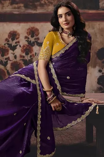 Dark purple shimmer faux satin saree with mustard yellow embroidered blouse