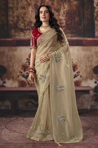 Beige gold shimmer saree faux organza saree with red embroidered blouse