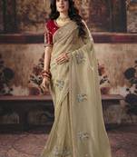 Beige gold shimmer saree faux organza saree with red embroidered blouse
